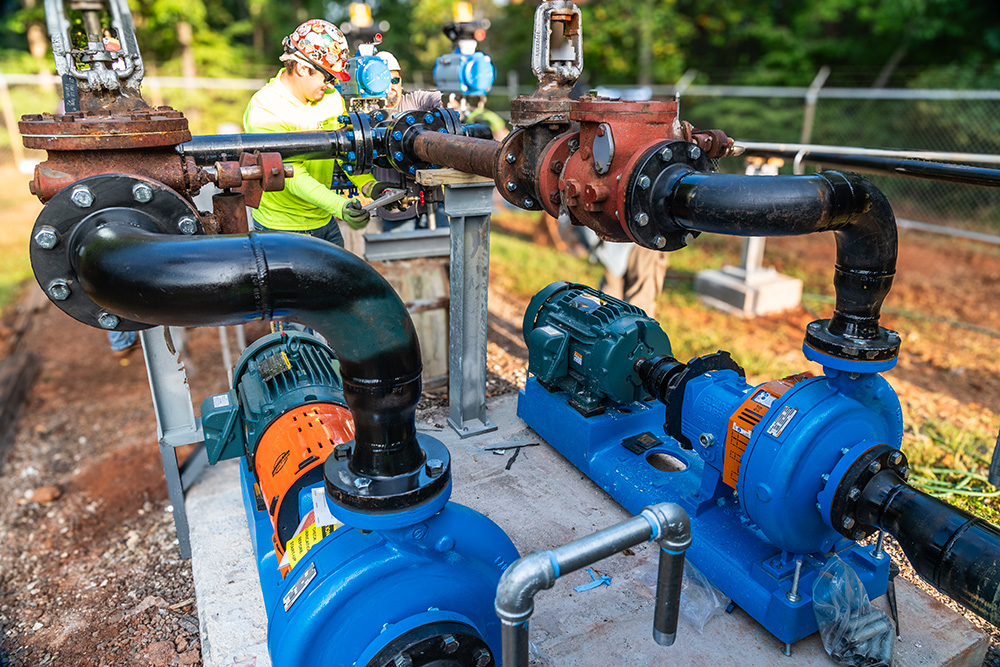 Mechanical and pipefitting team installs pumps and carbon piping lines