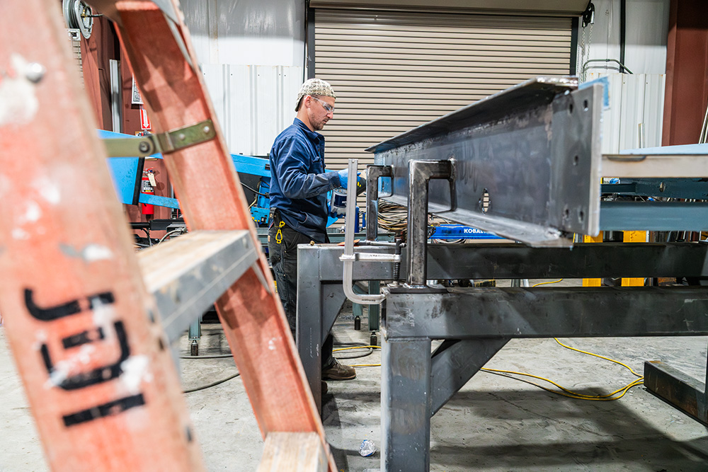 steel beam and column being prepared for painting and delivery