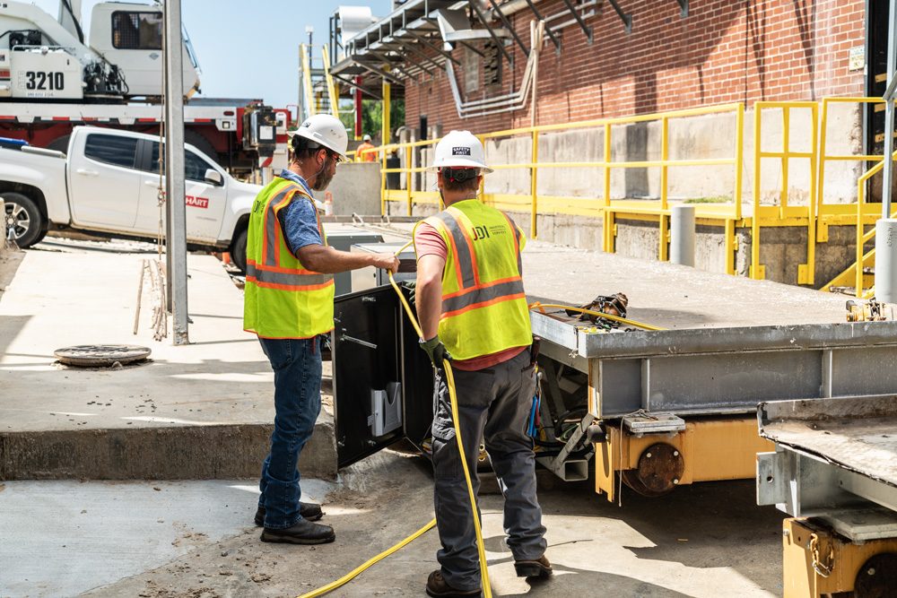 Mark and Wyatt connecting the subdeck motor control panels to the deck