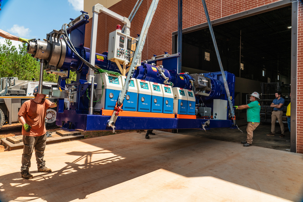 JDI Millwrights rigging and moving machinery at Aerofoam Turnkey Project