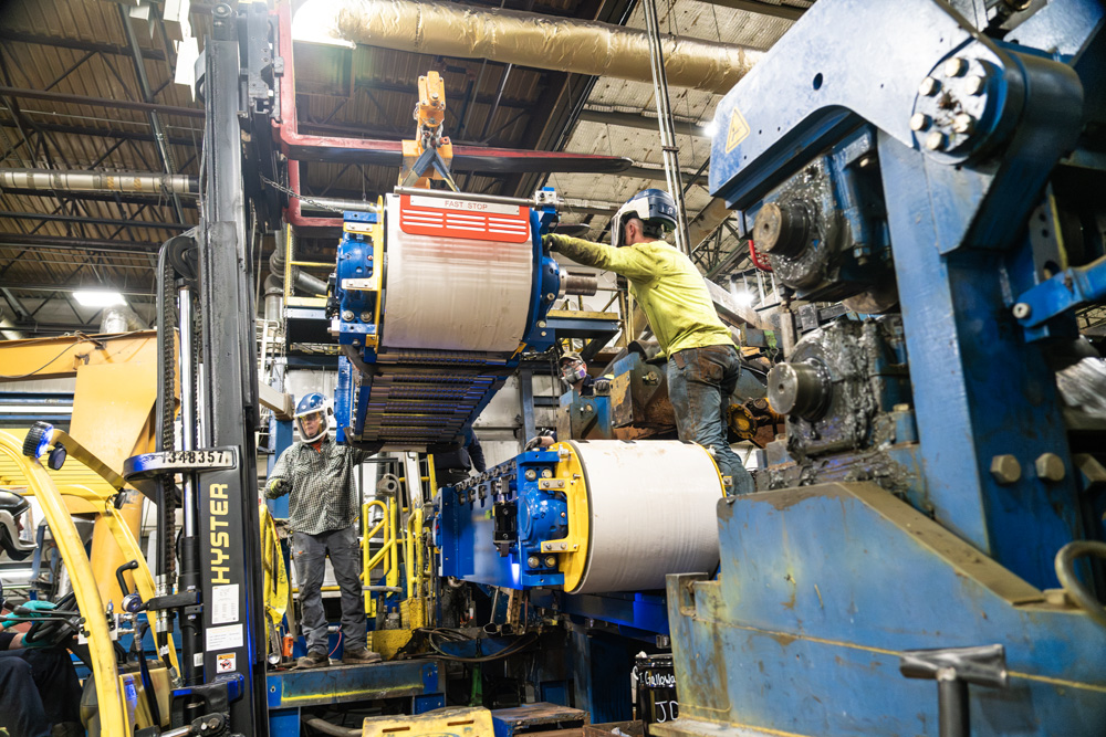 Hazelett machine installation rigging into place